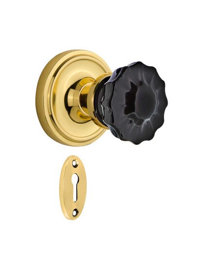 Classic Rosette Mortise Lock Set with Colored Fluted Crystal Glass Knobs Black in Un-Lacquered Brass.